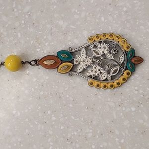 Necklace with bronze looking chain.